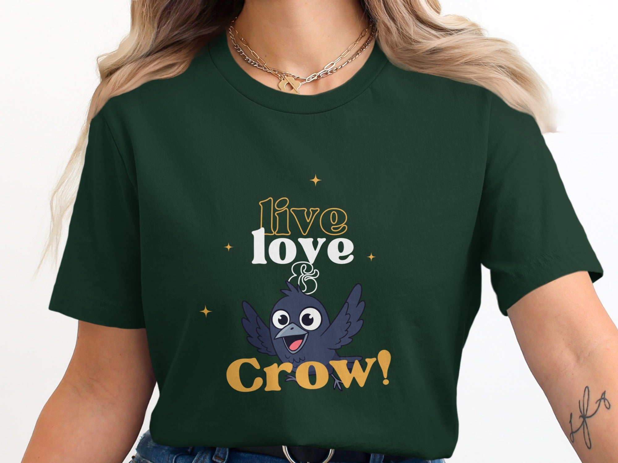 Dark green t-shirt with "live & crow" text and a cartoon crow.