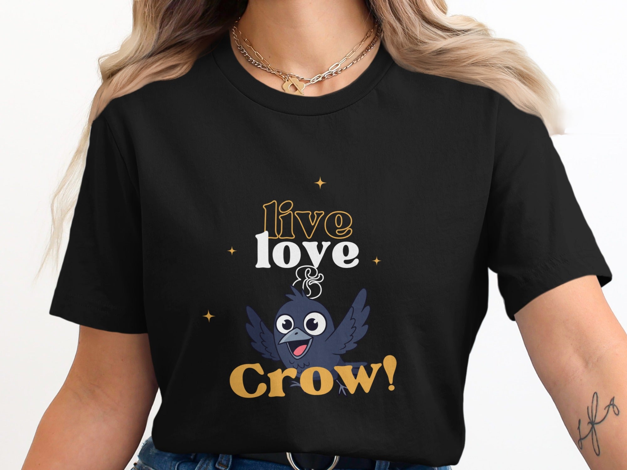 Black t-shirt with "live & crow" text and cartoon crow graphic.