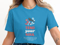 Blue t-shirt with "TEND your SOUL" text and floral bird design.