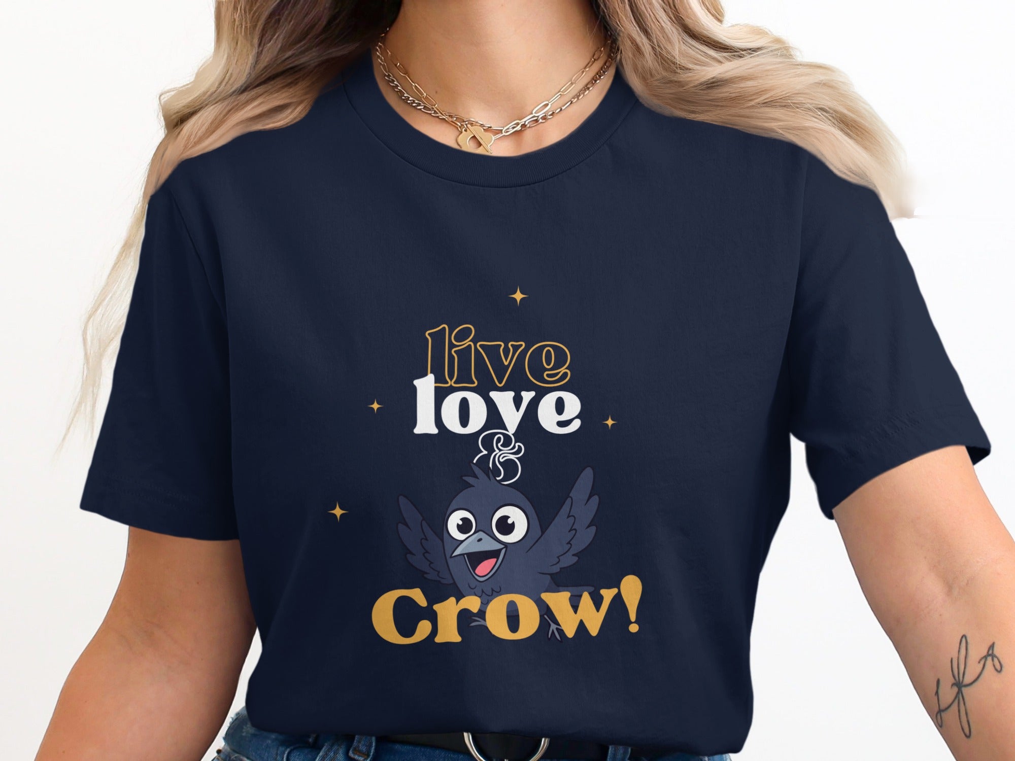 Navy t-shirt with "Live Love Crow!" text and cartoon crow graphic.